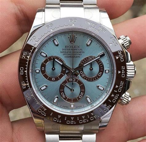 rolex with light blue face.